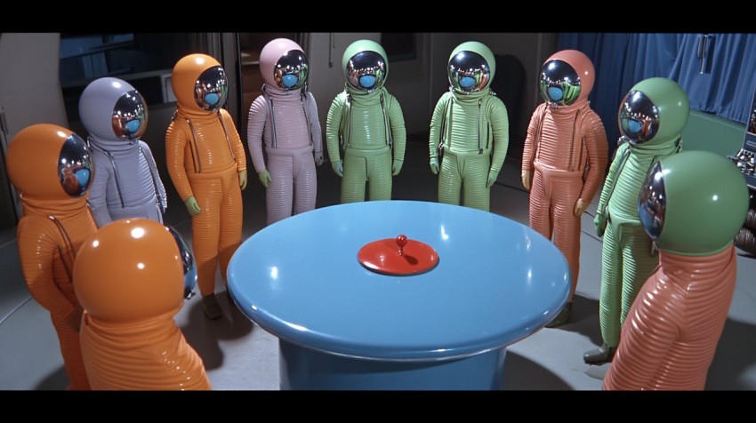 Colorful 1950s Spacesuits in Cafeteria