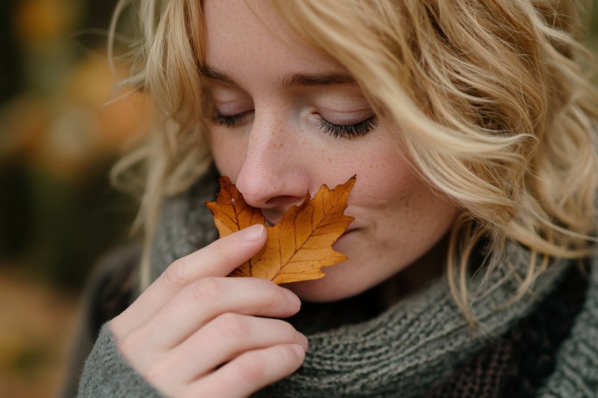 Blonde Woman Holding Autumn Leaf Canon EOS R5 Photo