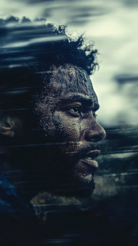 Mysterious Man with Dreads Surrounded by Clouds