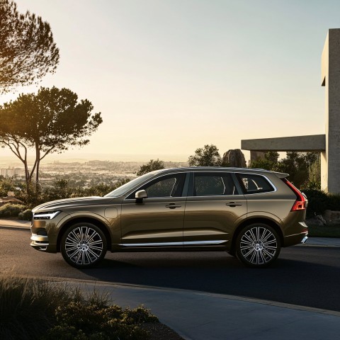 Luxury SUV Parked on Suburban Street Advertisement