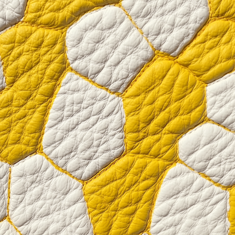 Close-Up of Yellow and White Textured Leather Pattern